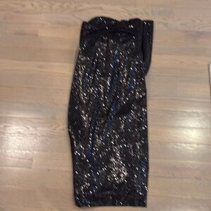 Beautiful black strapless sequin dress with large bow detail on the back
